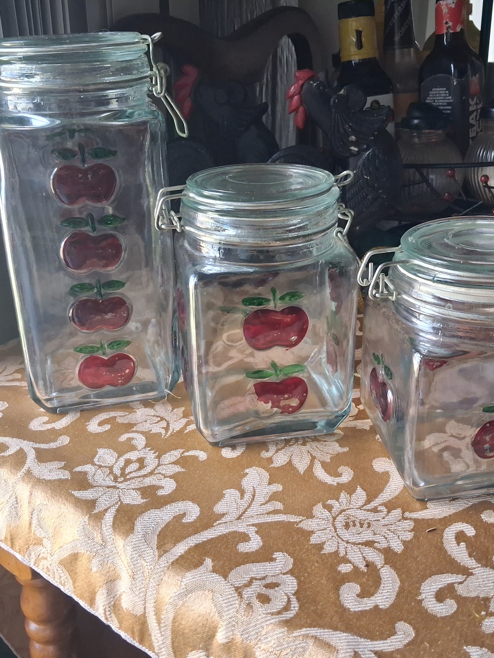 Hermes Clear Glass Storage Jars with Red Apple Motif
